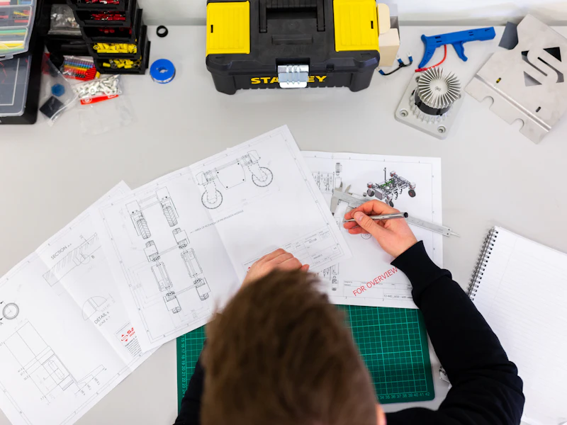 Engineers collaborating on a technical project